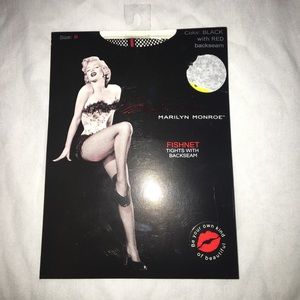 Marilyn Monroe Accessories - NWT Marilyn Monroe black/red fishnet stockings Marilyn Monroe Accessories - NWT Marilyn Monroe black/red fishnet stockings